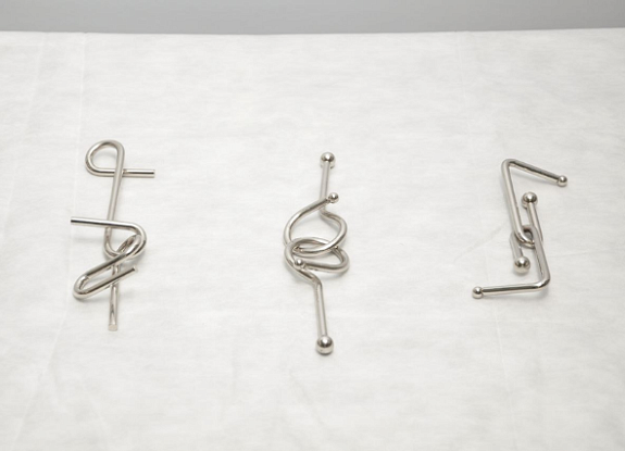 Металлические головоломки