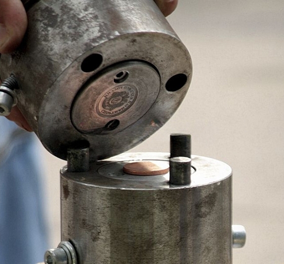 Аттракцион Чеканка монет рис 2