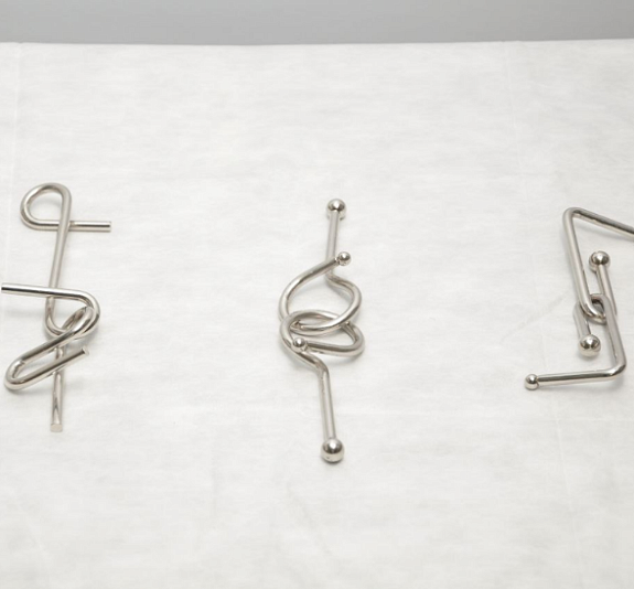 Металлические головоломки рис 3